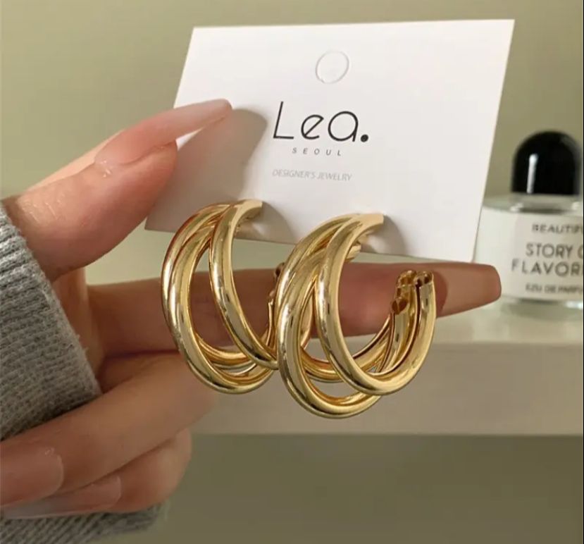 Exaggerated Golden Hoops