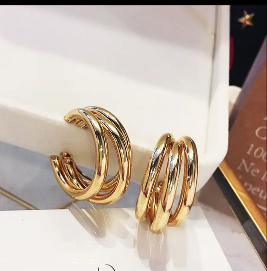 Exaggerated Golden Hoops